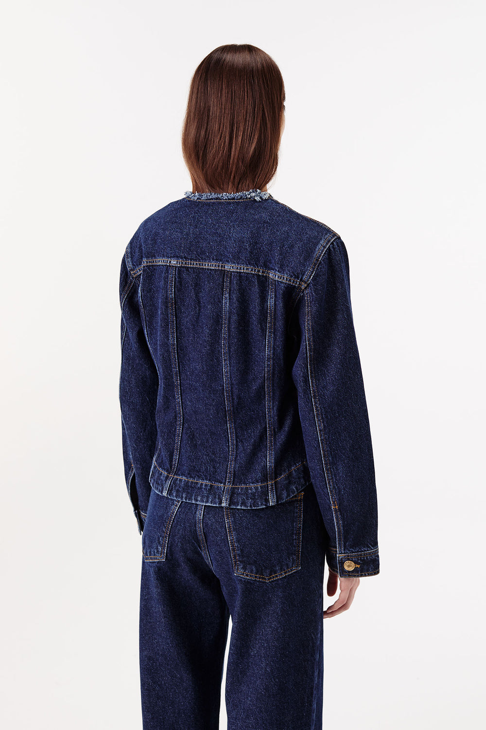 Denim jacket with braided buttonholes