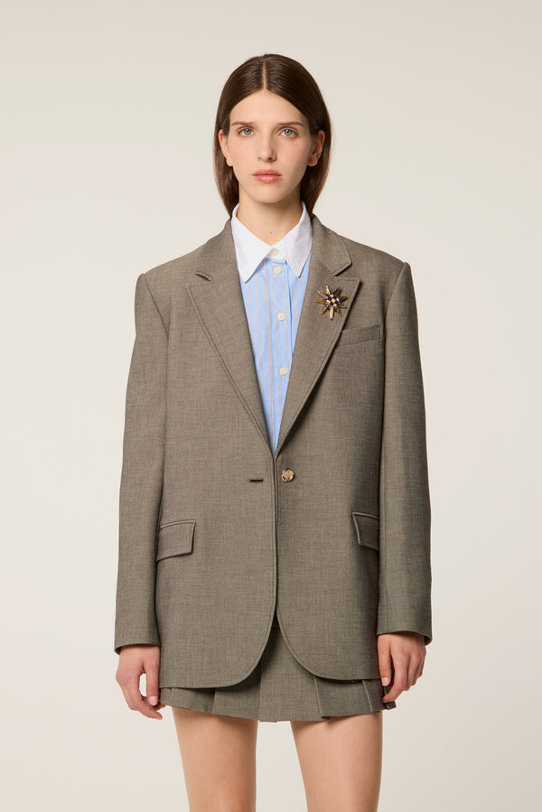 Tailored jacket with brooch