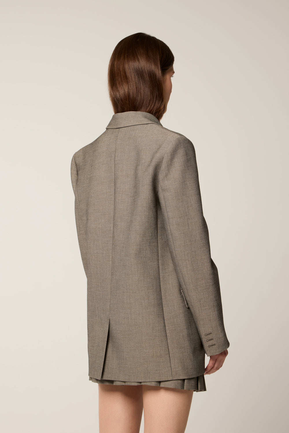 Tailored jacket with brooch