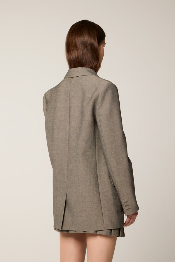 Tailored jacket with brooch