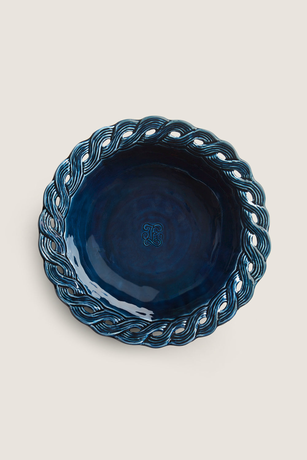 Ceramic bowl with braided rim