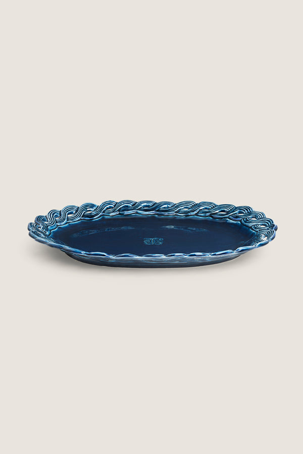Ceramic dish with braided edges