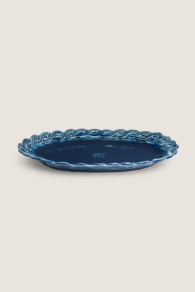 Ceramic dish with braided edges