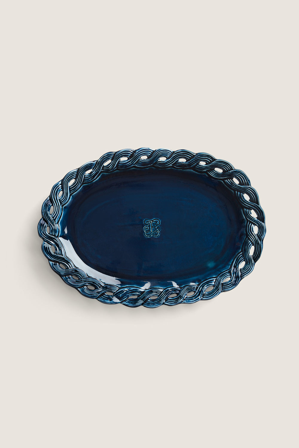 Ceramic dish with braided edges