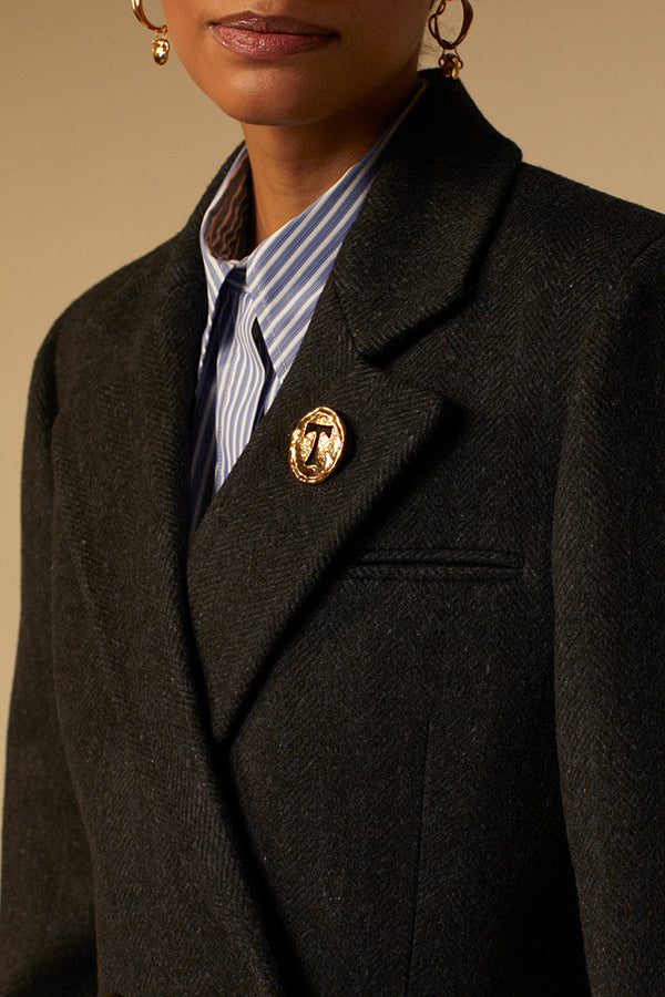 Wool suit jacket with brooch