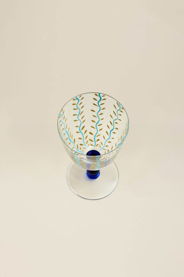 Turquoise stemmed glass with flower motif