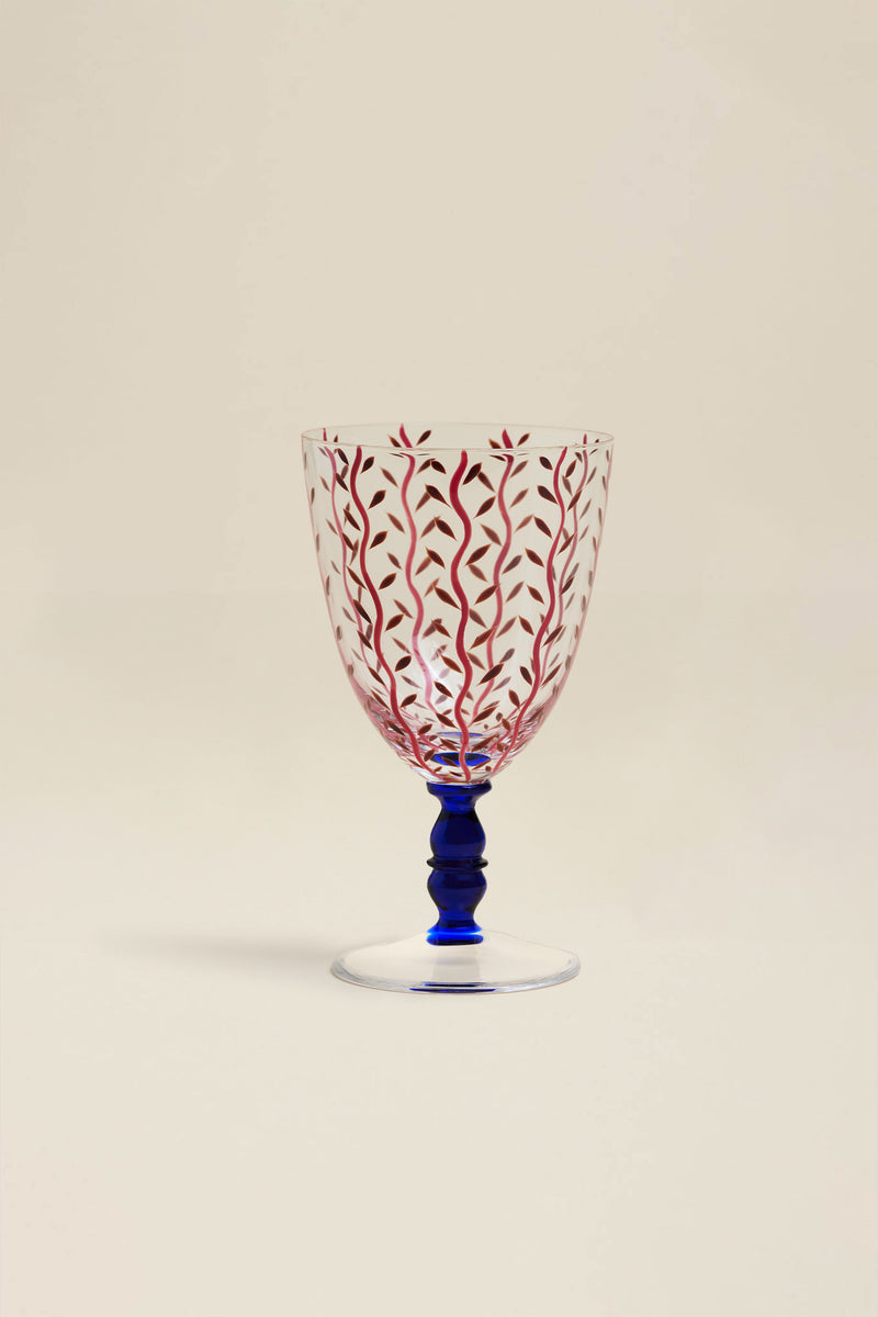 Red stemmed glass with flower motif