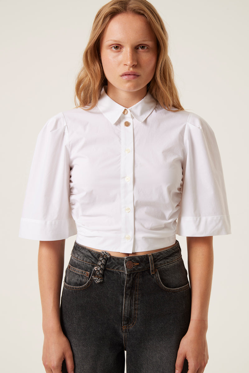 Short shirt with sunny buttons