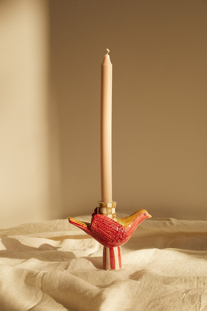 Bird and checkerboard candlestick